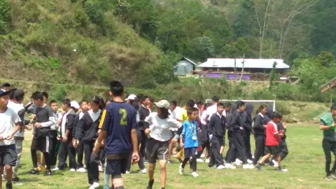 CBS students lining up for morning prayer before the start of game